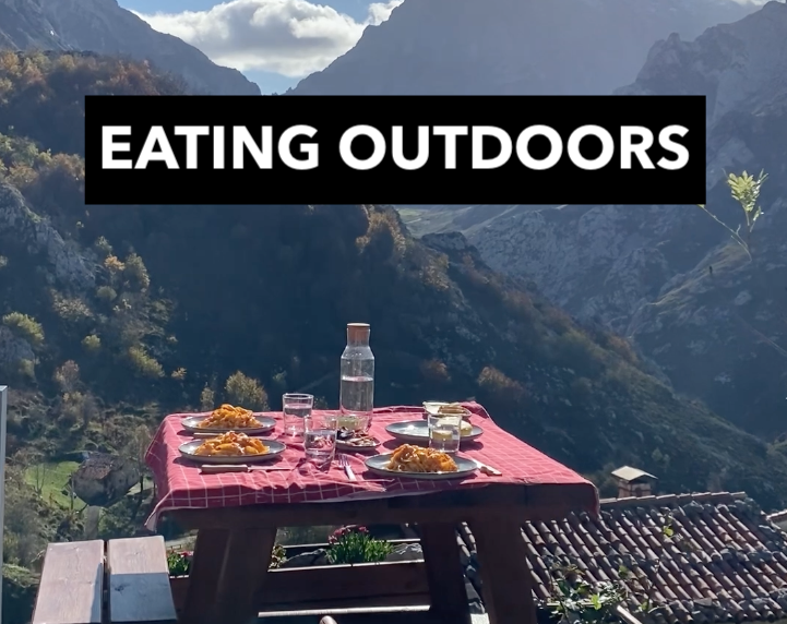 EATING OUTDOORS with these views is a simple, perfect luxury: a sunlit table, the silence of the valley, and the mountains right in front of you.